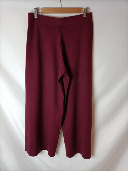 PURIFICACIÓN GARCIA. Pantalones culotte punto burdeos. T M
