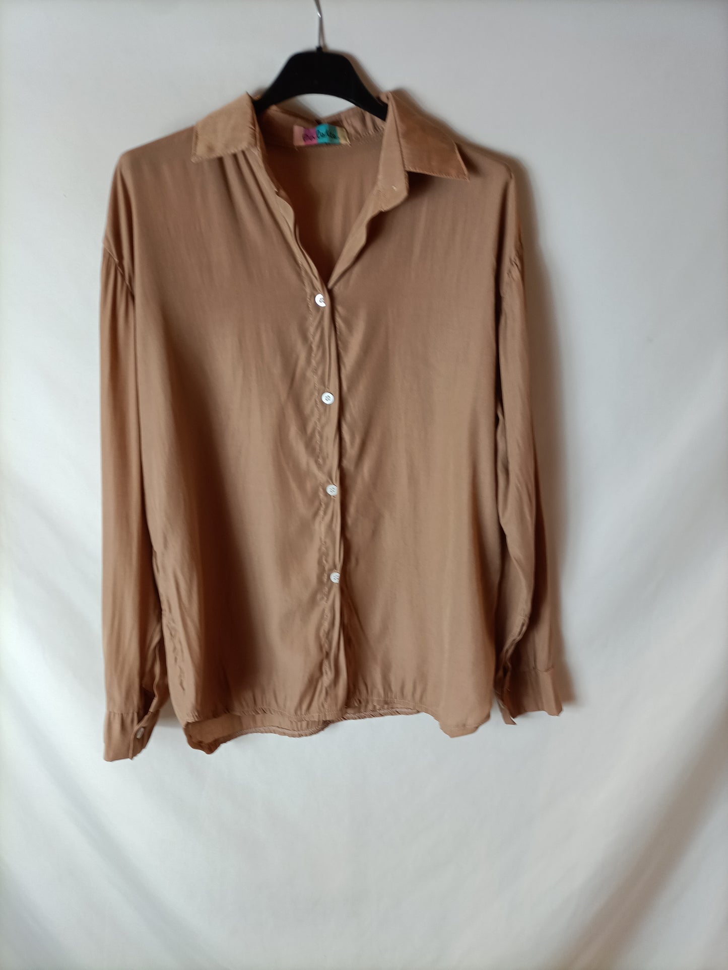 OTHERS. Light brown flowing blouse. TS