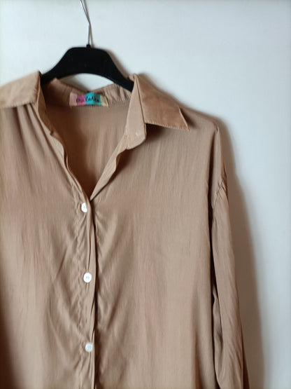 OTHERS. Light brown flowing blouse. TS