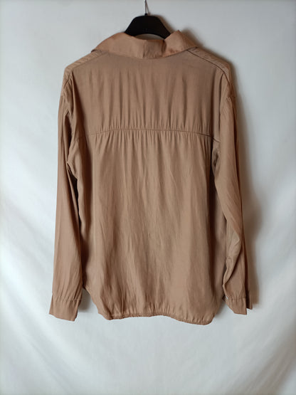 OTHERS. Light brown flowing blouse. TS