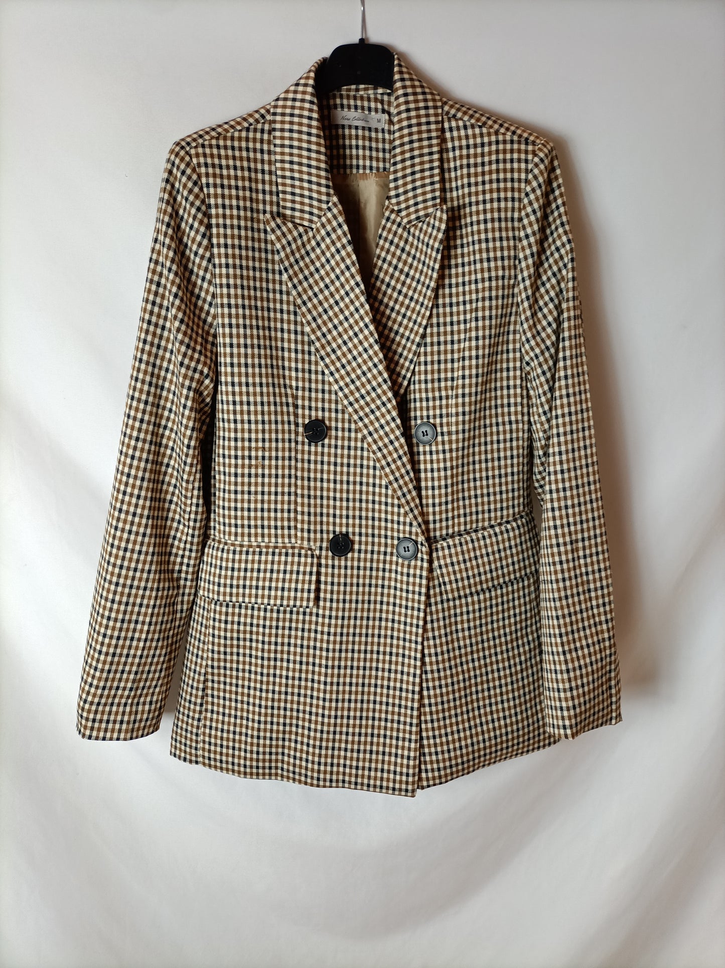 NEW COLLECTION. Double-breasted checked blazer. TM
