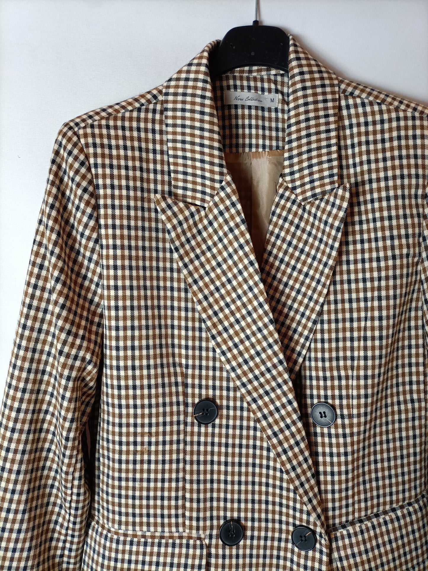NEW COLLECTION. Double-breasted checked blazer. TM