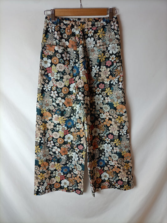 ERIC&CHIC .Pantalones negros flores T.xs