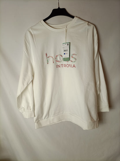 INTROPIA. White sweatshirt with Ts letters