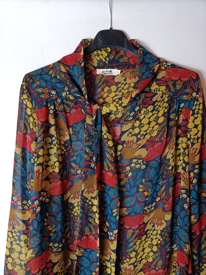 MOLLY BRACKEN. Blusa semitransparente estampada. T L