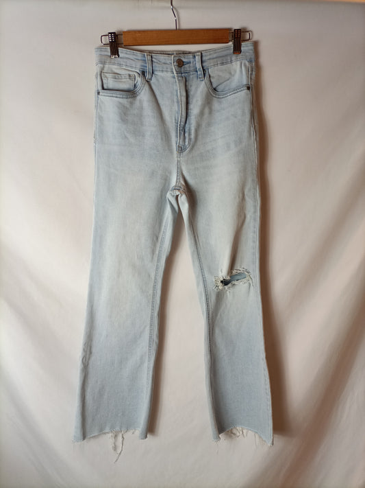 STRADIVARIUS. Light-colored flared trousers, size 40 (34)