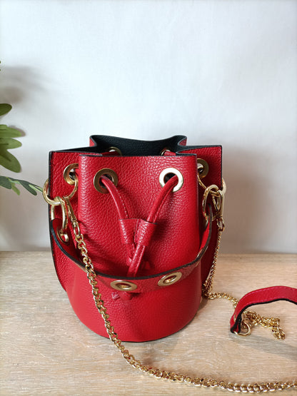 POZO PUERTO UBRIQUE. Bolso rojo piel