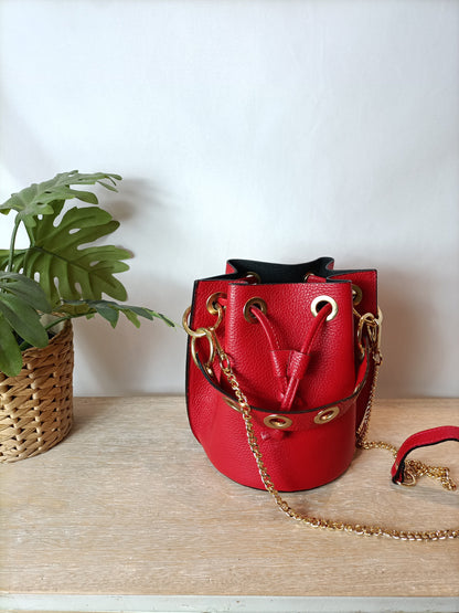 POZO PUERTO UBRIQUE. Bolso rojo piel