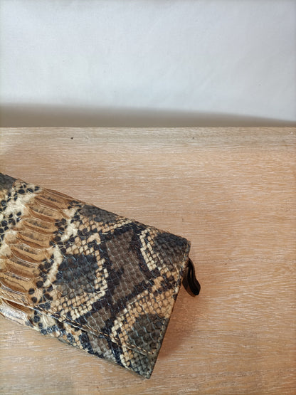 UTERQÜE. Cartera de piel