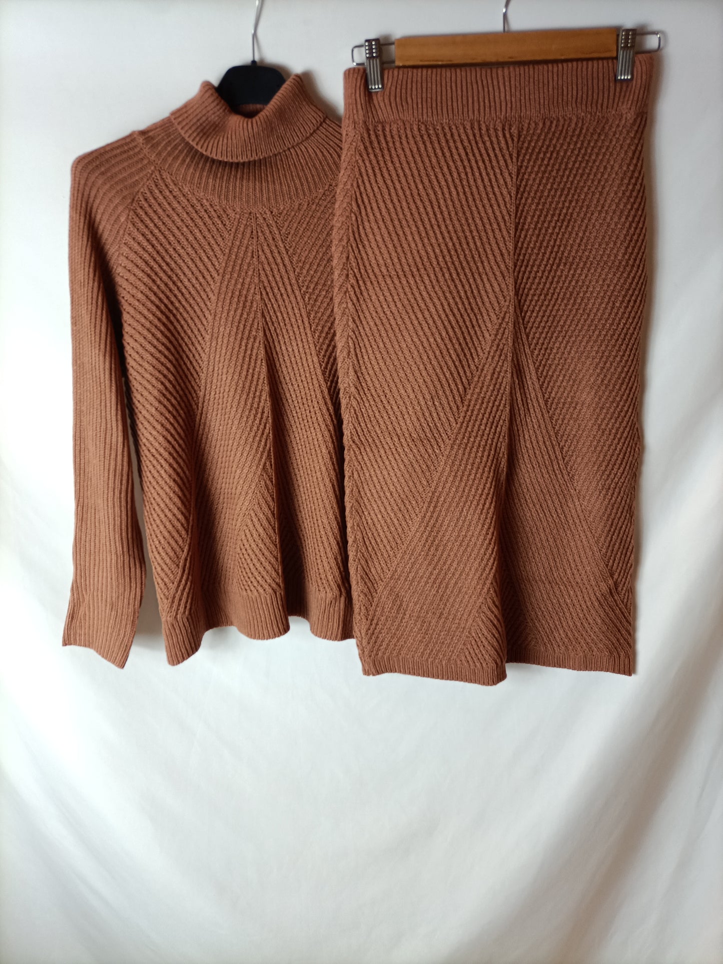 OTHER. Total look: brown knit skirt and sweater. TS