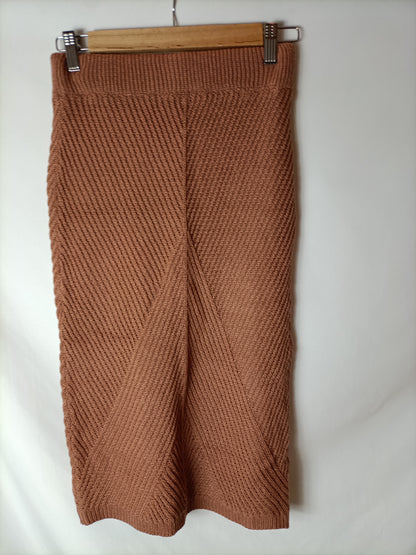 OTHER. Total look: brown knit skirt and sweater. TS