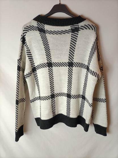 OTRAS. Total look falda y jersey punto cuadros T S/M