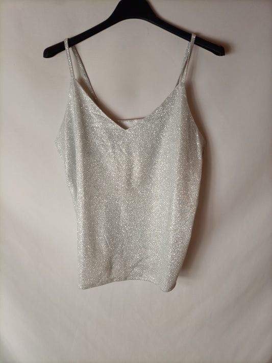 OTRAS. Top efecto plateado. T S