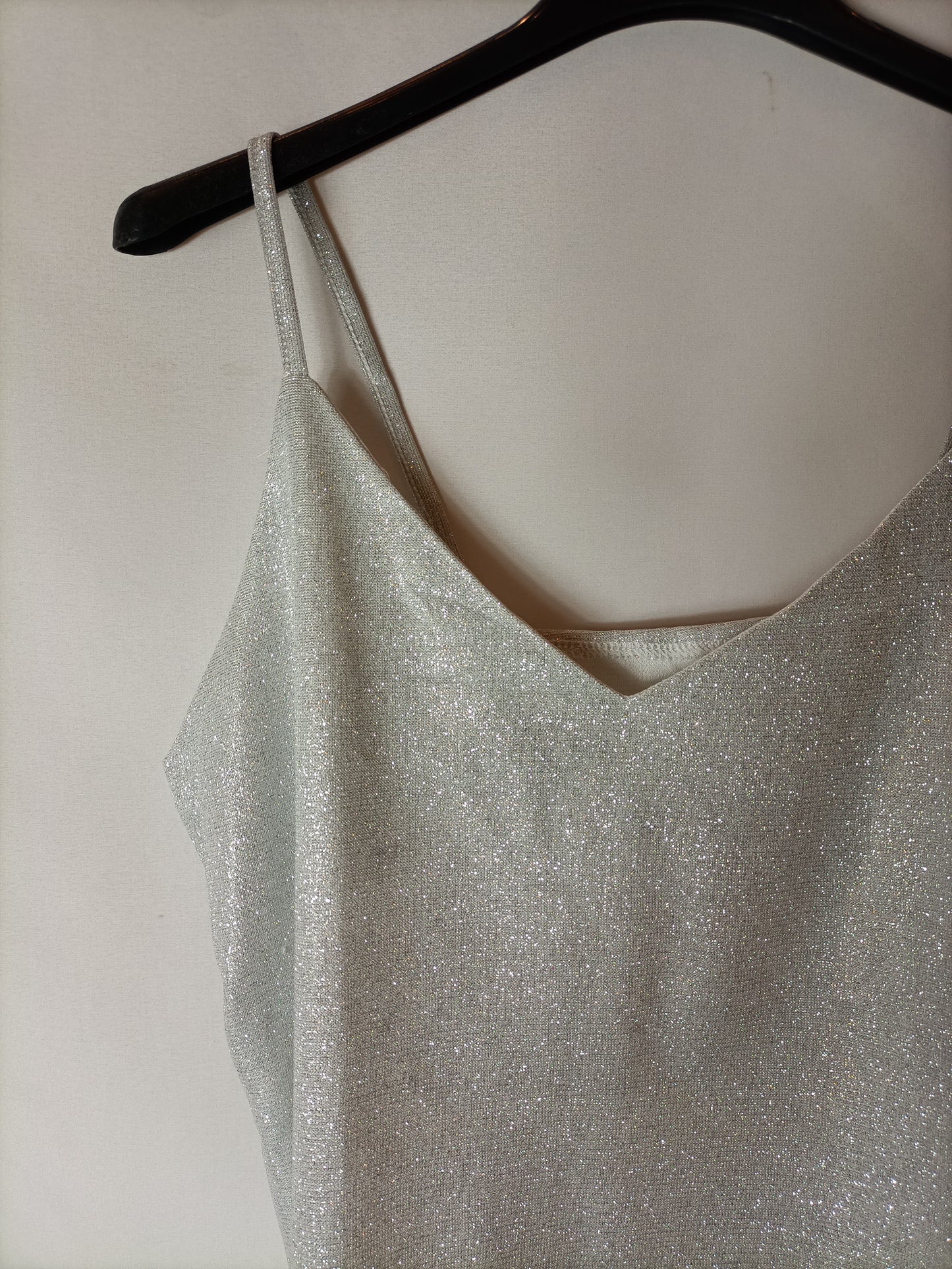 OTRAS. Top efecto plateado. T S