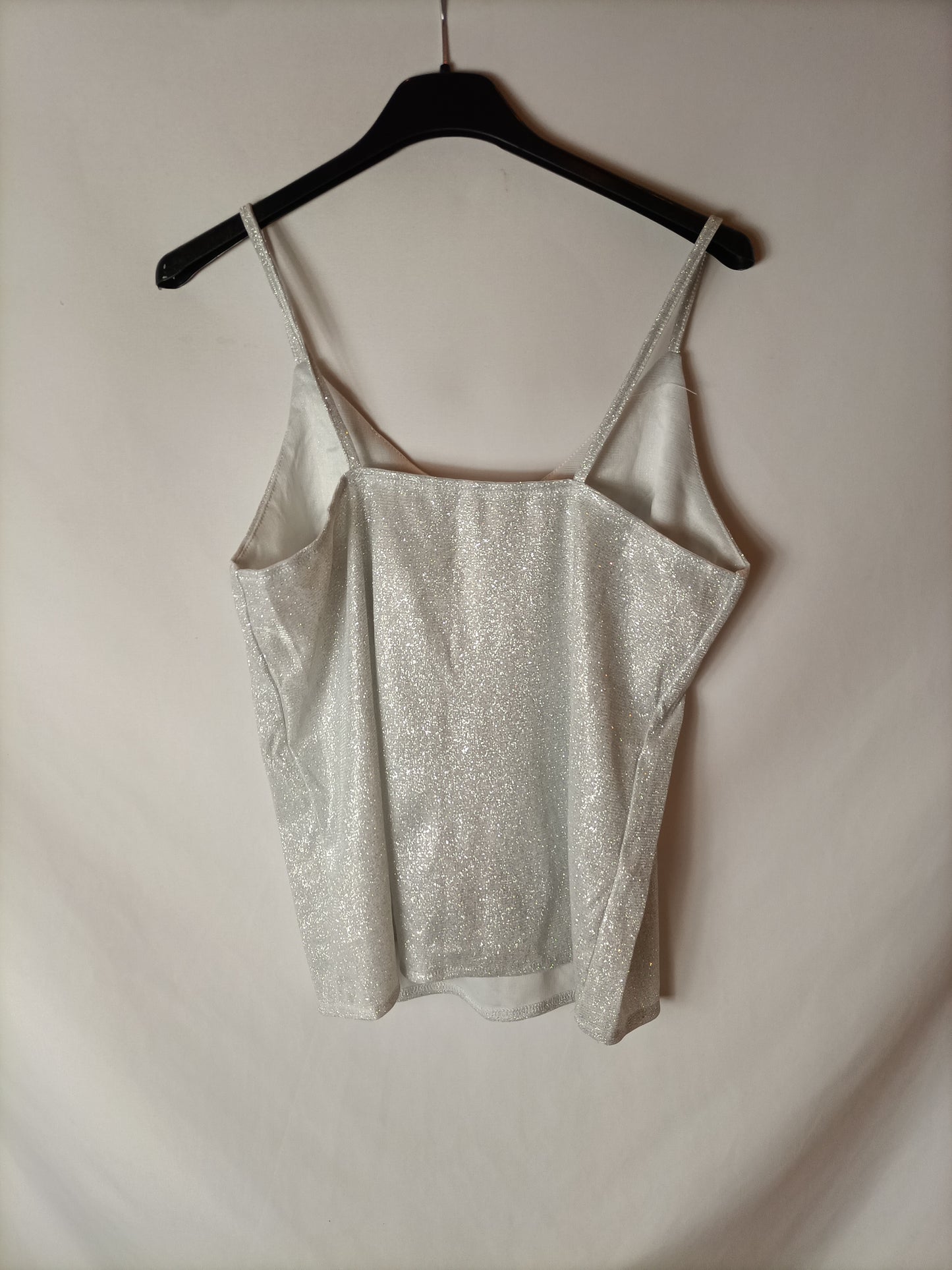 OTRAS. Top efecto plateado. T S