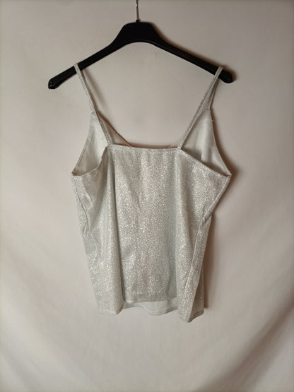 OTRAS. Top efecto plateado. T S