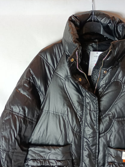 MICAICHSTUDIOS. Oversized black feathers. T.S.