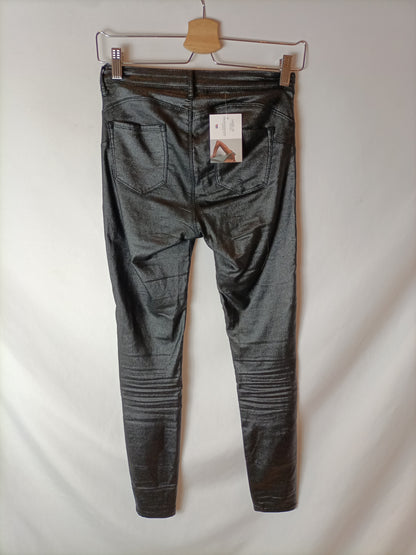 OTRAS. Pantalones purpurina pitillo T.34(tara)