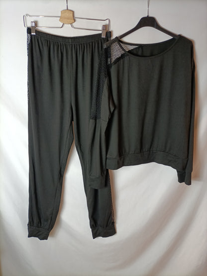 OTRAS. Total look negro rejilla T.l