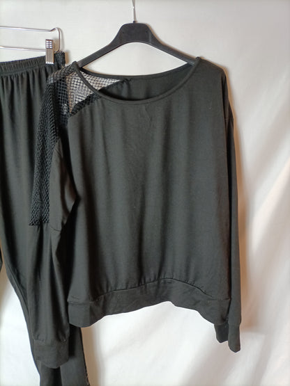 OTRAS. Total look negro rejilla T.l