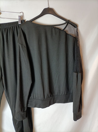 OTRAS. Total look negro rejilla T.l