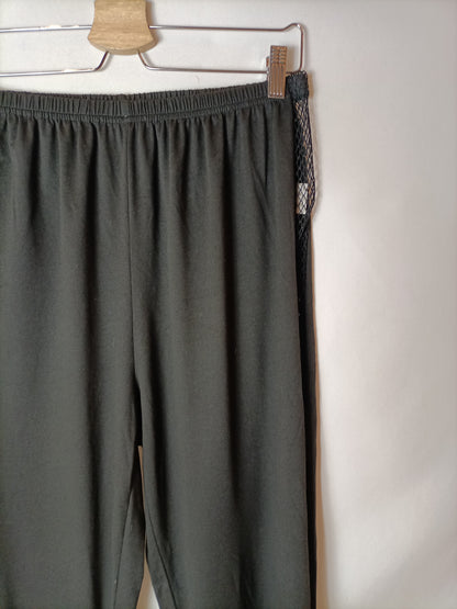 OTRAS. Total look negro rejilla T.l