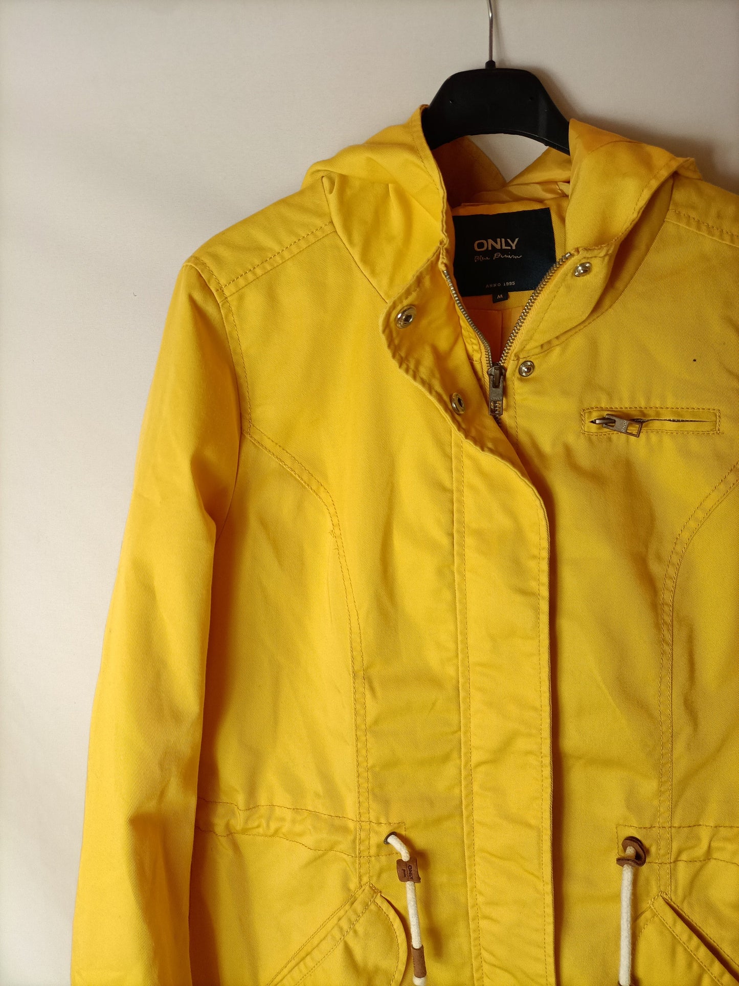 ONLY. Yellow hooded parka. TM (Tare)