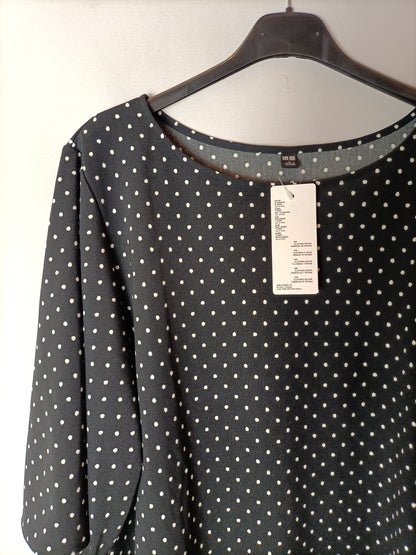 UNIQLO. Top fluido lunares. T L