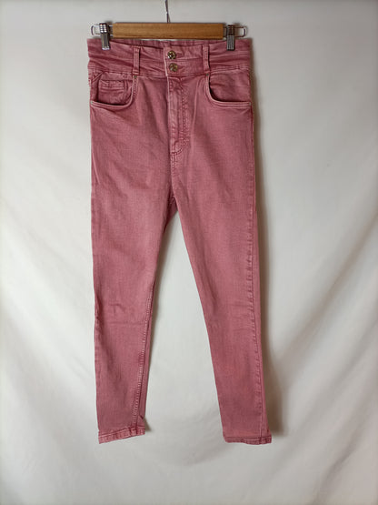 BERSHKA.Pantalón denim rosa T.38