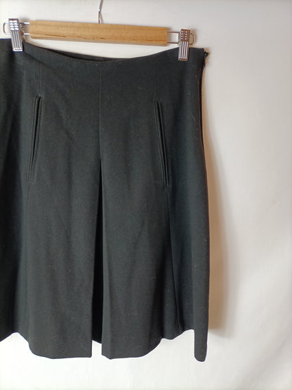 ZARA. Falda negra tablas fluida T.s