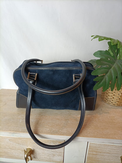 OTRAS. Bolso azul antelina.