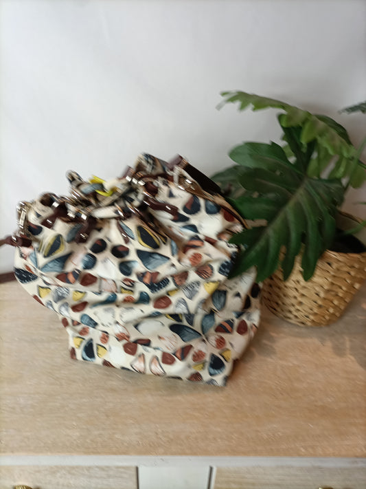 BIMBA Y LOLA. Bolso estampado acolchado