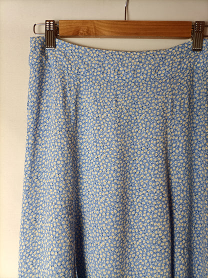 H&M. falda midi flores T.36