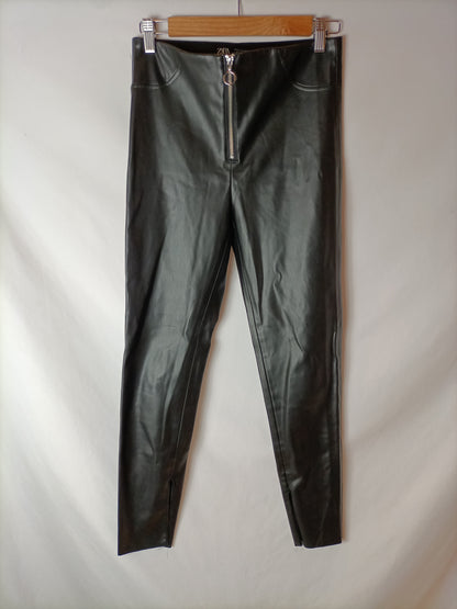 ZARA. Black faux leather leggings with zippers. TS
