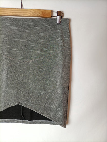 BERSHKA. Falda gris jaspeada T.l