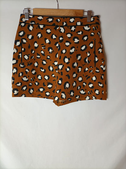 ZARA. Shorts mostaza print T.m