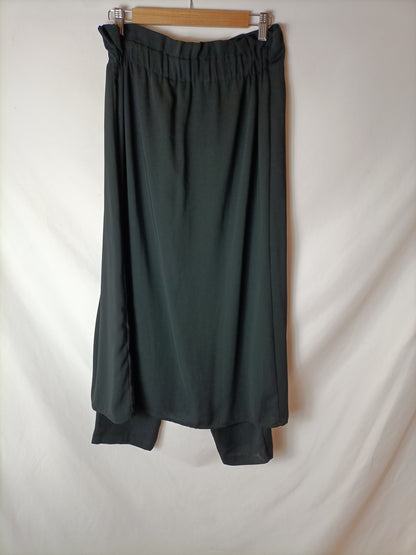 ZARA. Falda/pantalón midi botones T.m