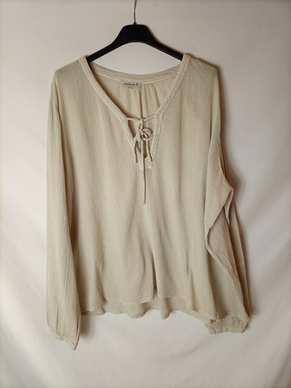 NATURA. Blusa beige semitransparente. T L/XL