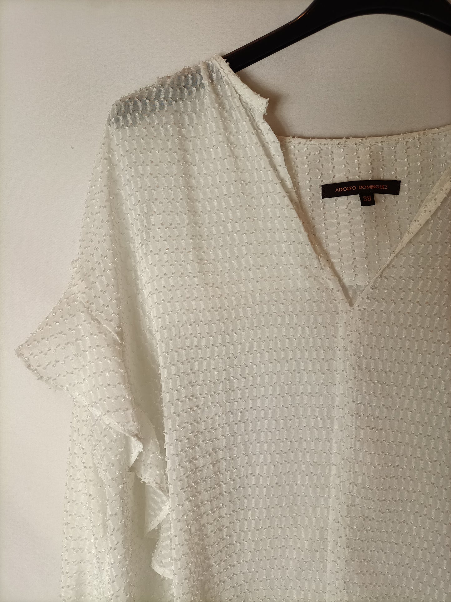 ADOLFO DOMINGUEZ. Blusa textura semitransparente. T 38