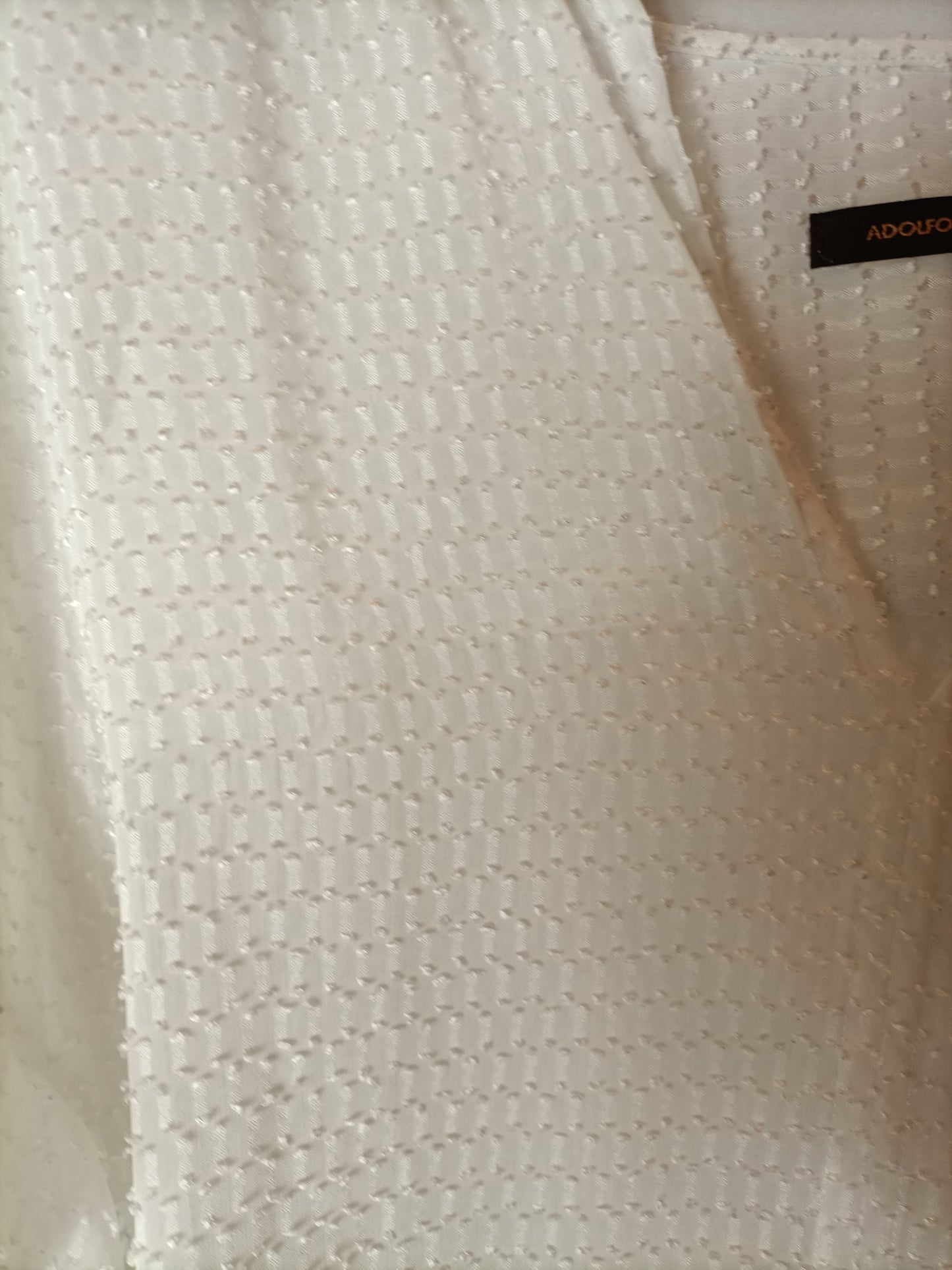 ADOLFO DOMINGUEZ. Blusa textura semitransparente. T 38