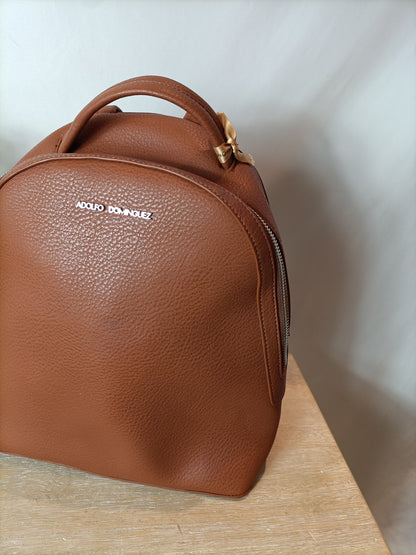 ADOLFO DOMINGUEZ. Brown leather backpack. (Tare)