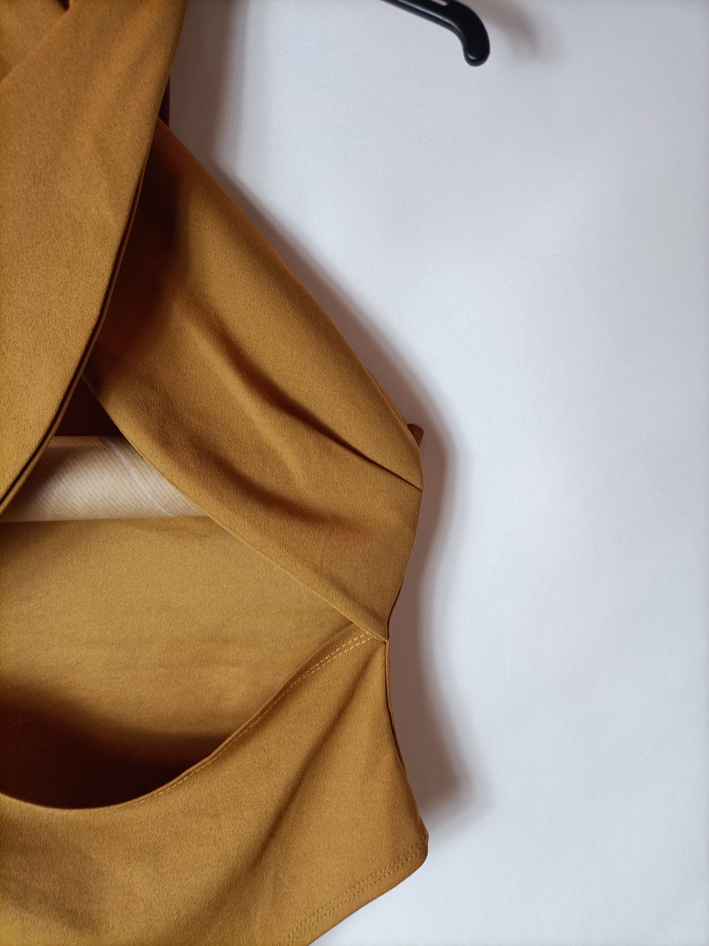 OTHERS. Mustard bodysuit with openings. TS