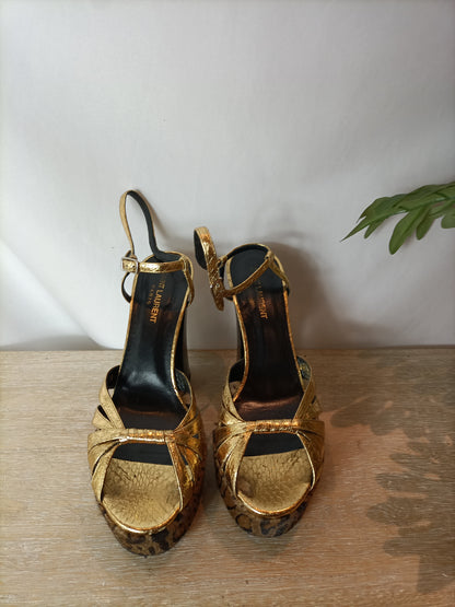 SAINT LAURENT. Zapatos plataforma dorados y animal print. T 39