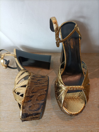 SAINT LAURENT. Zapatos plataforma dorados y animal print. T 39