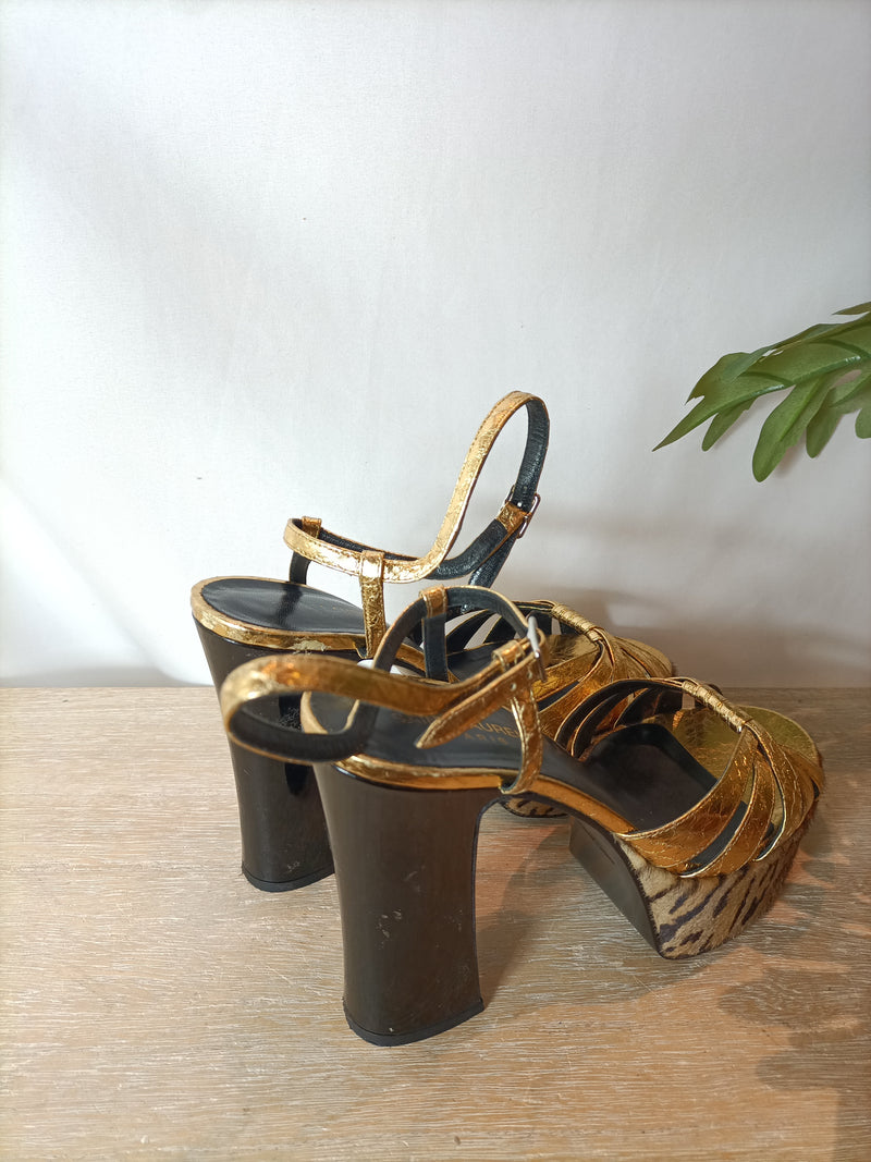 SAINT LAURENT. Zapatos plataforma dorados y animal print. T 39