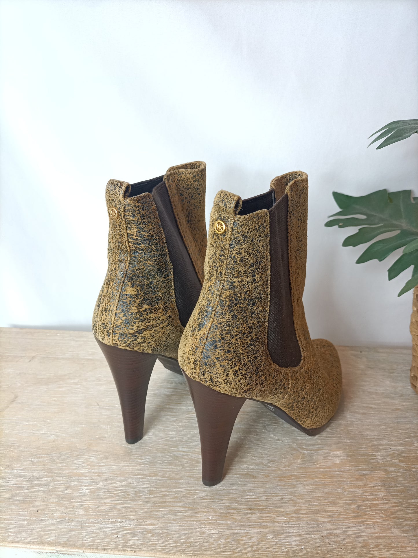 MICHAEL KORS. Printed leather boots, size 38.5