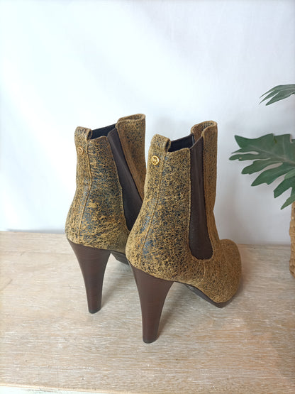 MICHAEL KORS. Printed leather boots, size 38.5