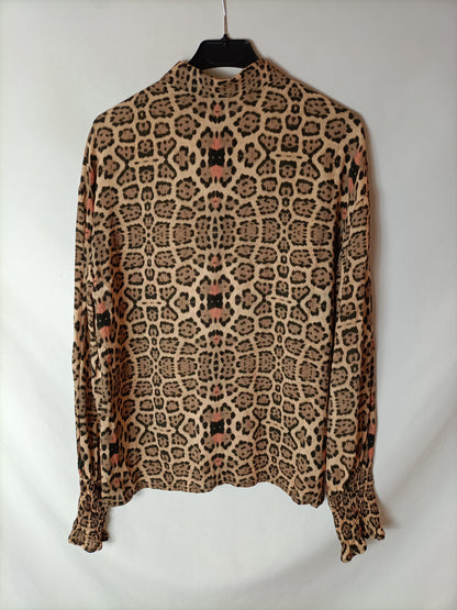 ALIX. Total look: Animal print blouse and skirt. Size XS