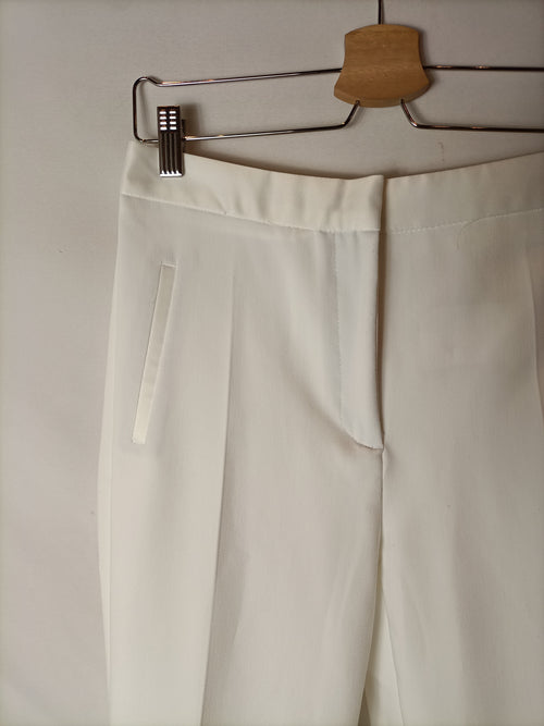 OTRAS (zara). Pantalón blanco detalles raso T.u(38) tara
