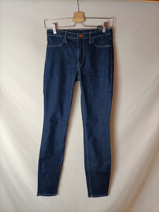 H&M. Pantalón oscuro denim T.13/14